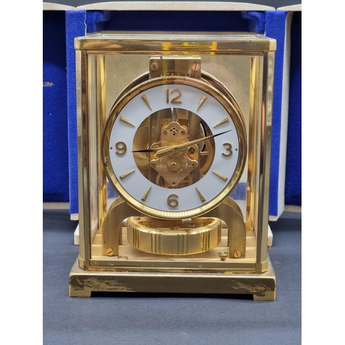 1126 - A Jaeger-LeCoultre brass Atmos clock, serial no. 297490, in original case.