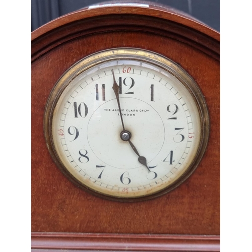 1135 - An Edwardian mahogany and inlaid lancet form mantel clock, 32cm high, with pendulum; together with a... 