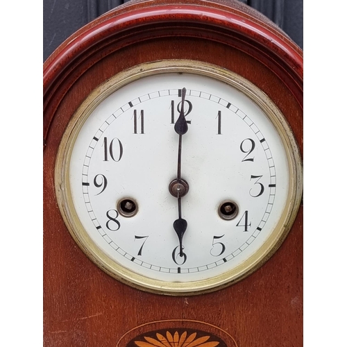 1137 - An Edwardian mahogany and inlaid mantel clock, 31.5cm high, with pendulum.