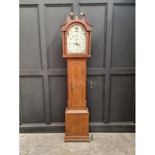 1140 - A George III oak and mahogany eight day longcase clock, the 12in painted arched dial inscribed ... 