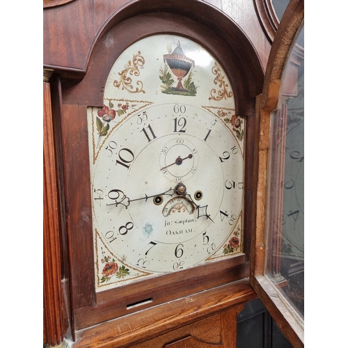 1140 - A George III oak and mahogany eight day longcase clock, the 12in painted arched dial inscribed ... 