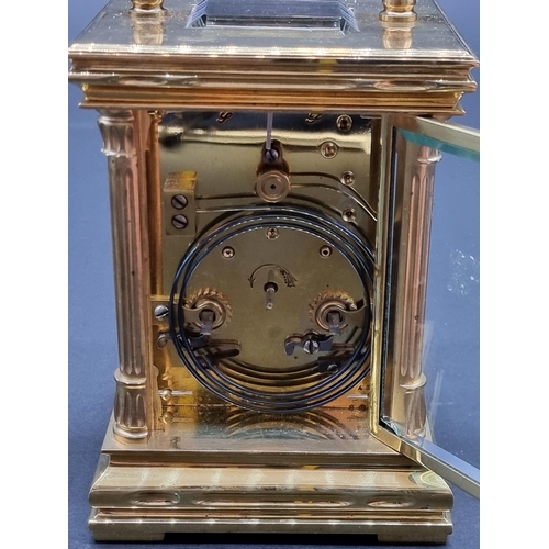 1145 - A good and large late 19th century French brass carriage clock, striking on a gong, height including... 