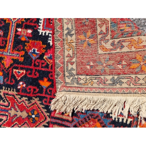 1156 - A Persian rug, having central diamond medallion; together with a small Persian floral rug, largest, ... 