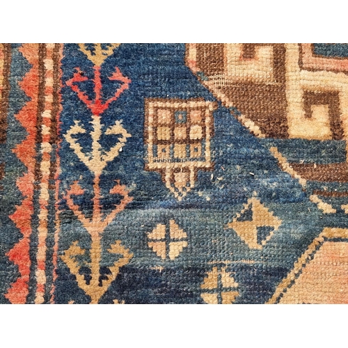 1157 - A Caucasian rug, having three central medallions, with star decoration to borders, 175 x 139cm.... 