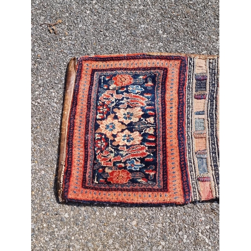 1163 - An old Persian saddle bag, 108 x 47cm.