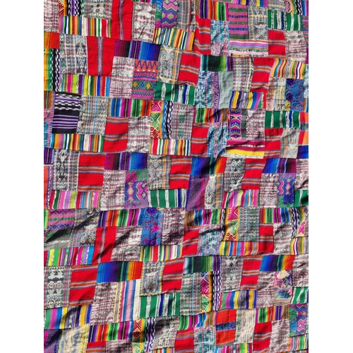 1167 - An old patchwork quilt, 220 x 197cm.