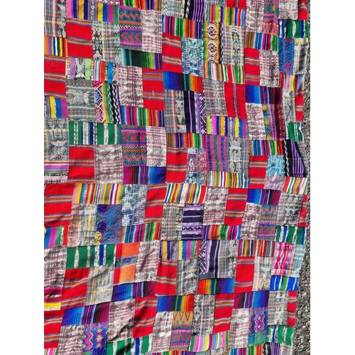 1167 - An old patchwork quilt, 220 x 197cm.