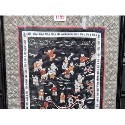 1199 - A Chinese silk embroidered 'Hundred Boys' panel, 64 x 31.5cm.