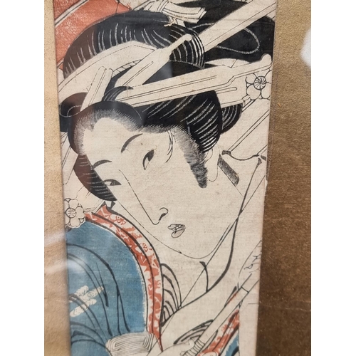 1220 - Keisai Eisen (Japanese), a Geisha with a parasol, inscribed, woodblock print, 72 x 24cm; togeth... 