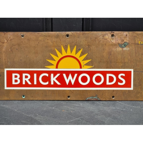 1321 - Advertising: a brass and polychrome painted 'Brickwoods' sign, 21.5 x 59.5cm.Brickwoods was a Portsm... 