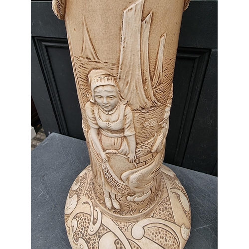 1329 - A pair of Bretby pottery pedestals, 71.5cm high.