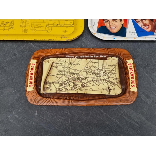 1344 - Advertising: three old metal trays, comprising 'The Beatles'; 'Brickwoods Brewery'; and 'Continental... 