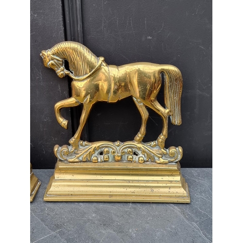 1356 - A pair of Victorian cast brass horse doorstops, 27cm high.