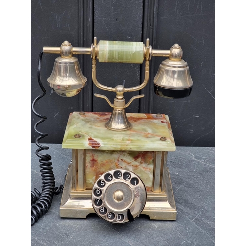 1364 - A green onyx and brass telephone.