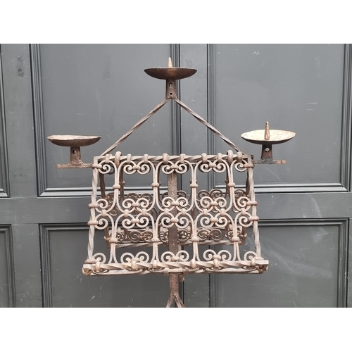 1370 - A large wrought iron lectern, 173cm high.