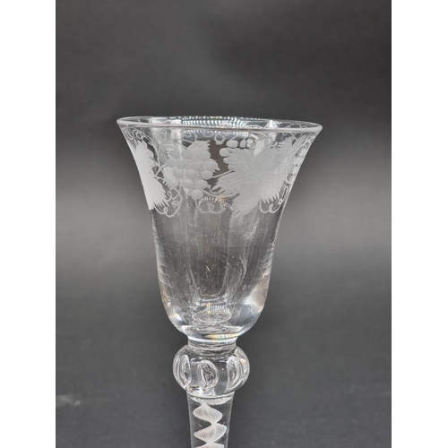 1388 - An 18th century opaque air twist wine glass, with engraved bowl and air bead knop, 17.8cm.... 