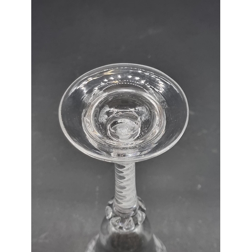 1388 - An 18th century opaque air twist wine glass, with engraved bowl and air bead knop, 17.8cm.... 