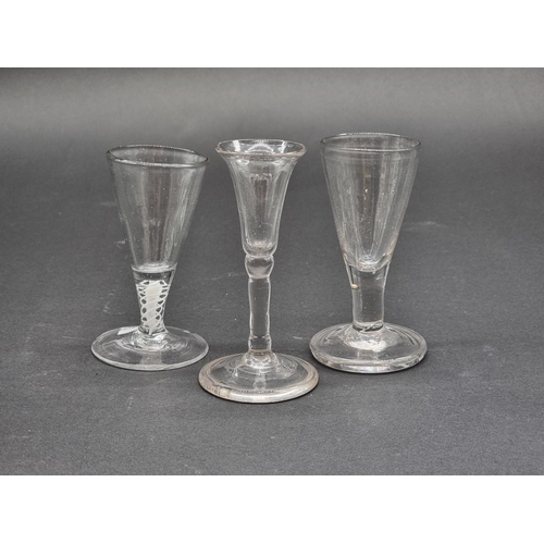 1394 - Three small 18th century glasses, largest 11.3cm, (small chip to foot rim of air twist example).... 