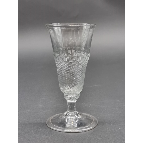 1398 - An 18th century wrythen twist ale glass, 14.3cm.