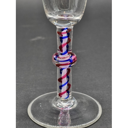 1399 - A 19th century colour twist wine glass, 15.5cm.