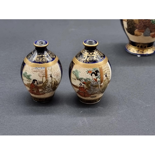 1404 - Three small Japanese Satsuma pottery vases, largest 9.5cm high.