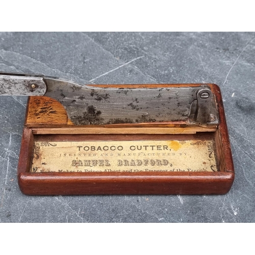 1447 - A Victorian tobacco cutter, labelled 'Samuel Bradford...', 22cm long.