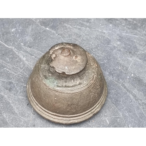 1449 - An antique copper alloy temple bell, 9.5cm high.