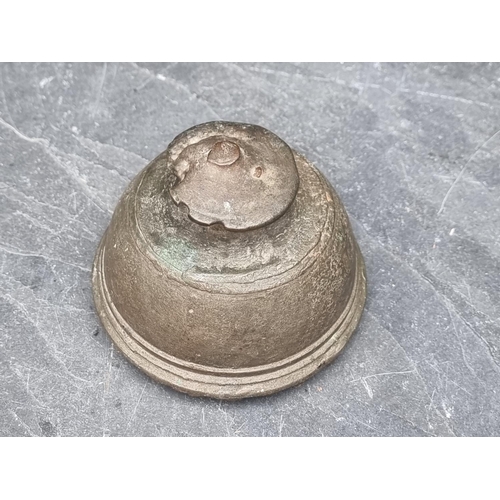 1449 - An antique copper alloy temple bell, 9.5cm high.