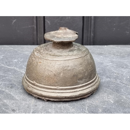 1449 - An antique copper alloy temple bell, 9.5cm high.