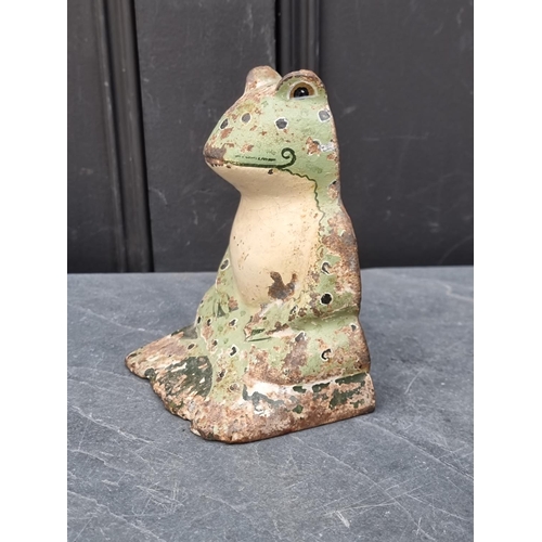 1451 - A polychrome painted cast iron frog doorstop, 16cm high.