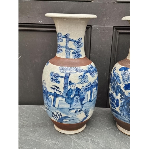 1462 - A pair of Chinese blue and white crackle glaze vases, 44.5cm high.