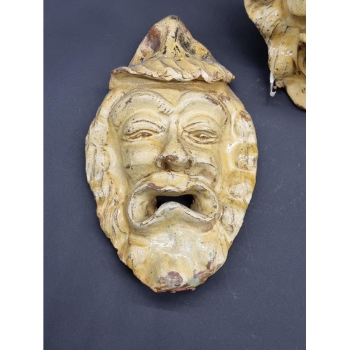 1513 - Studio Pottery: a set of three wall masks, largest 22.5cm high.