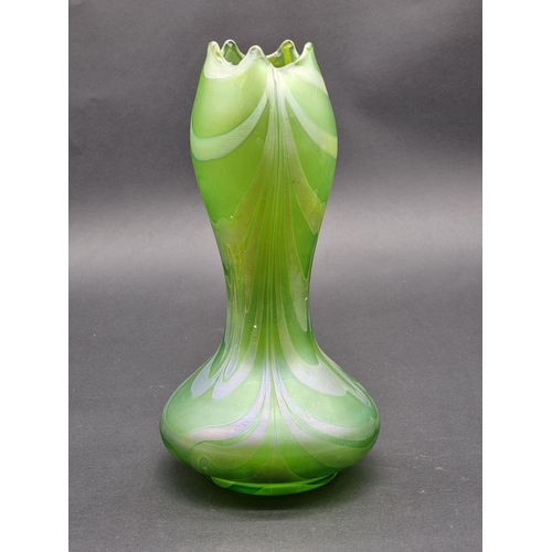 1534 - A Loetz style iridescent glass vase, 27cm high.