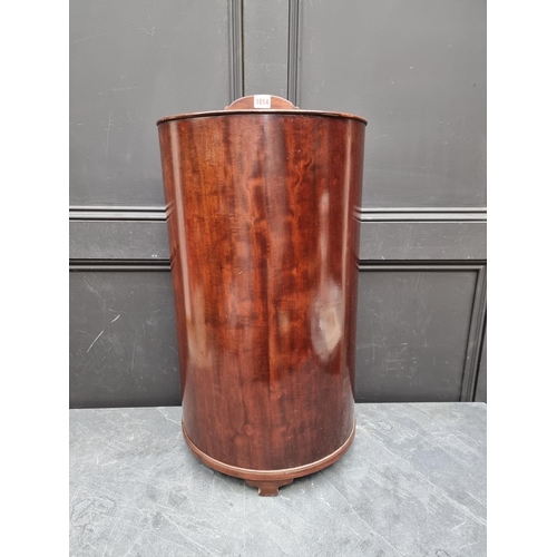 1014 - An unusual antique mahogany demi-lune stick stand, with liner, 40.5cm wide.