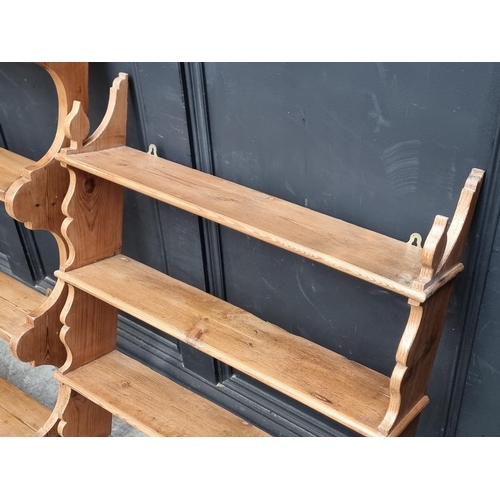 1018 - Two similar old pine hanging open bookshelves, largest 103cm high x 62.5cm wide.... 