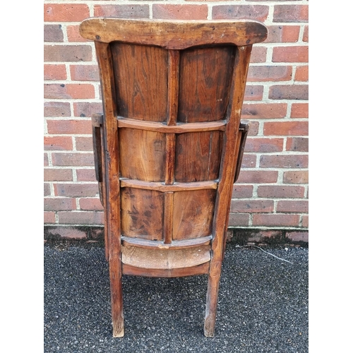 1058 - A 19th century ash, elm and fruitwood lambing type chair.