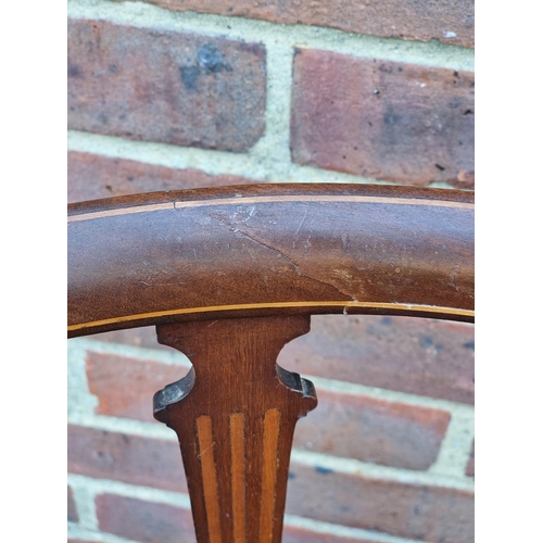 1059 - A circa 1900 mahogany and inlaid salon tub chair.