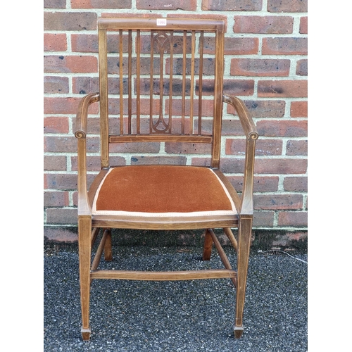 1060 - An Edwardian mahogany, chequer and line inlaid elbow chair.