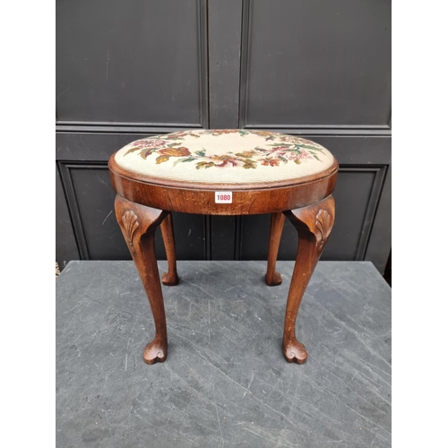 1080 - A 1930s, George I style, walnut stool, with trefid feet.