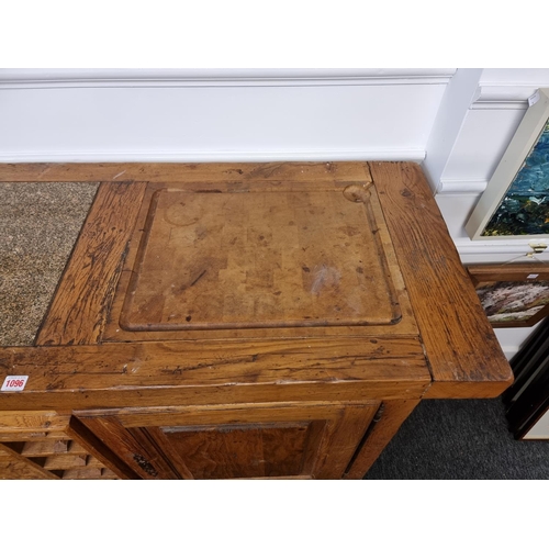 1096 - An unusual French oak kitchen unit, the top incorporating a marble inset and butcher's block, 153cm ... 