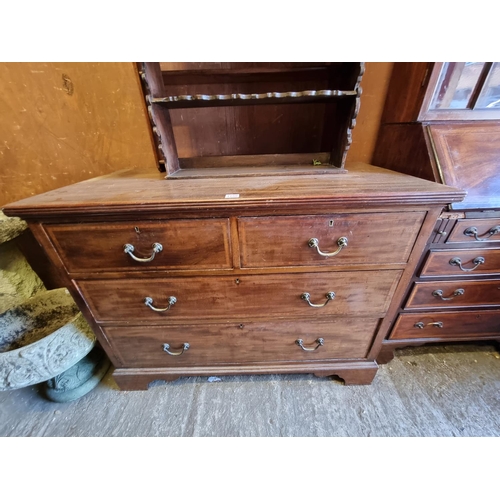 1100 - A circa 1900 mahogany and satinwood crossbanded chest of drawers, 105.5cm wide.... 