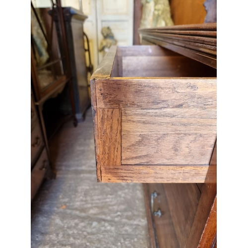 1100 - A circa 1900 mahogany and satinwood crossbanded chest of drawers, 105.5cm wide.... 