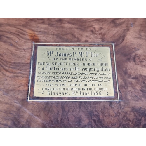 1109 - A Victorian figured walnut and brass writing slope, baring plaque inscribed 'Mr James P McPhie,... 