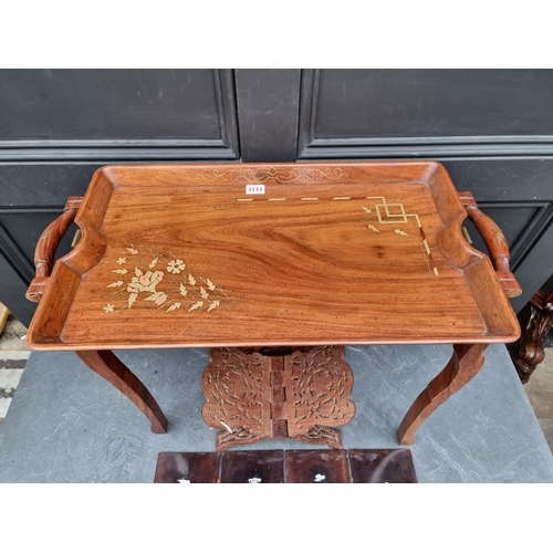 1111 - An Eastern hardwood and brass inlaid folding tray, 65.5cm wide; together with a small folding h... 