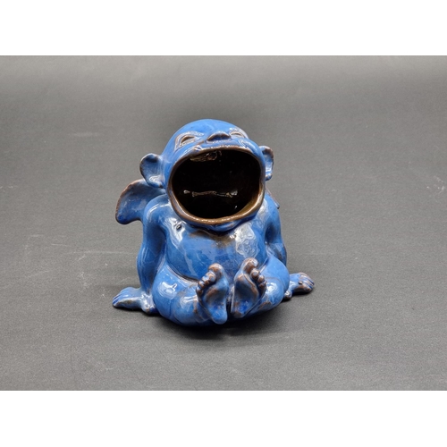 1542 - A Brannam pottery novelty spoon warmer, in the form of a winged goblin, 11.5cm high.... 