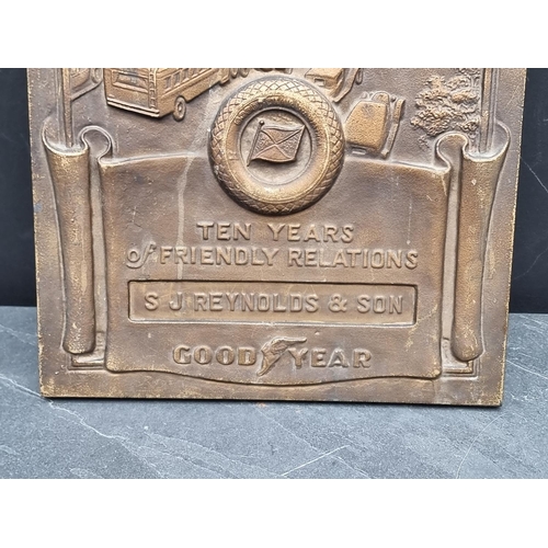 1556 - A Goodyear 'Ten Years of Friendly Relations' bronze plaque, 43.5 x 30.5cm.