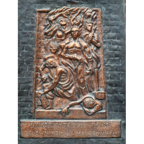 1557 - A copper relief WWII commemorative Jewish plaque, inscribed in Polish, 52 x 43.5cm.... 