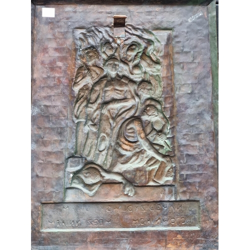 1557 - A copper relief WWII commemorative Jewish plaque, inscribed in Polish, 52 x 43.5cm.... 