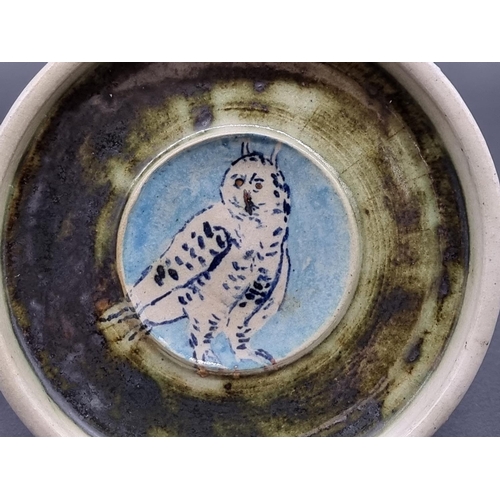 1569 - Eric James Mellon, an owl dish, inscribed and dated 10/90, 14.5cm diameter.