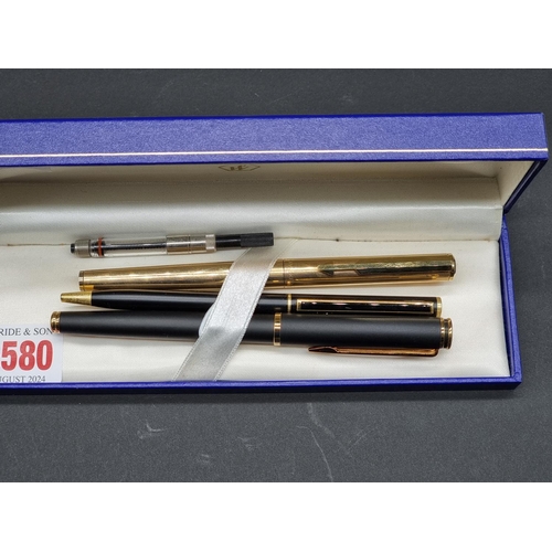 1580 - A Waterman fountain pen, boxed; together with a Parker gilt fountain pen; and another. (3)... 